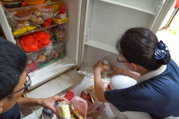 Grandma Wong’s fridge is stuffed full of food items. Photo by Nichelle Chan